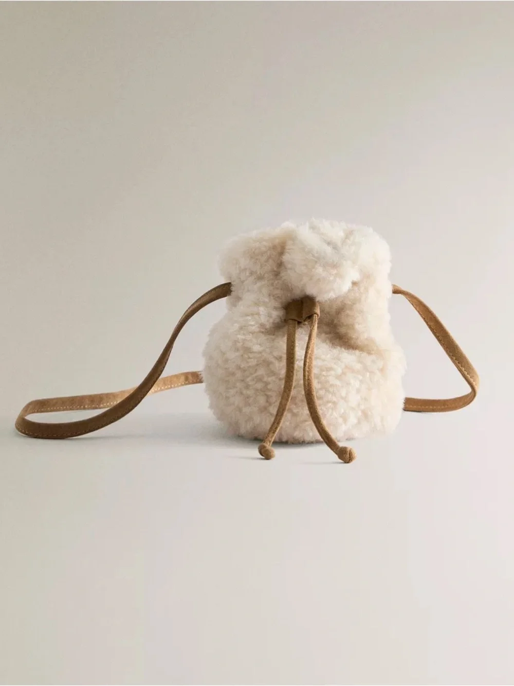 Zara Cream Shearling Drawstring Crossbody Bag with Tan Strap